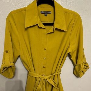 Bright, beautiful casual, but business attire with pockets love the color